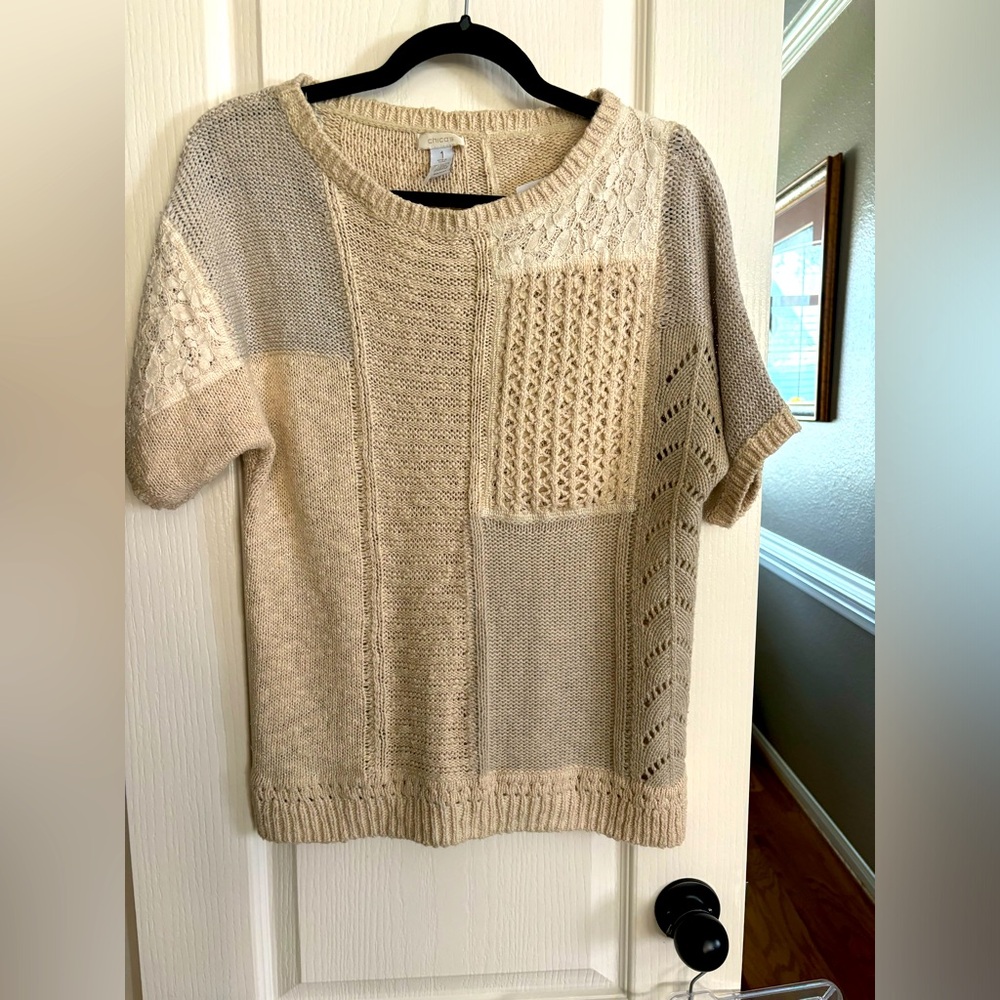 Beautiful sweater by Chicos size one. In gorgeous used condition.